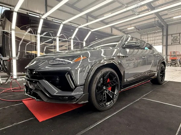 Grey Lamborghini Urus in the bay