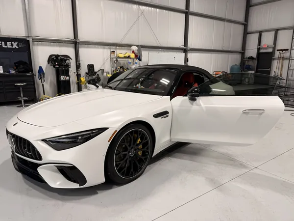 White Mercedes-AMG SL in the shop
