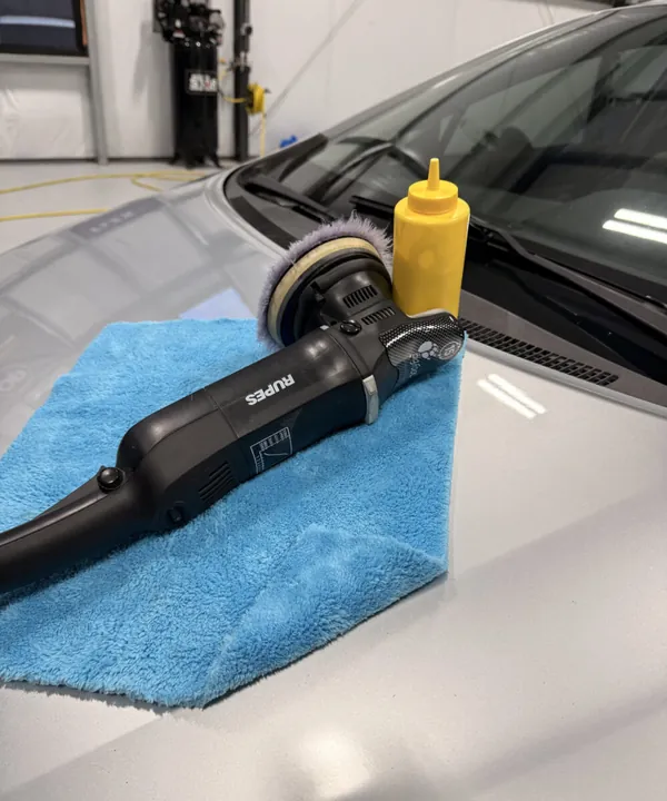 Polisher and product on a silver hood