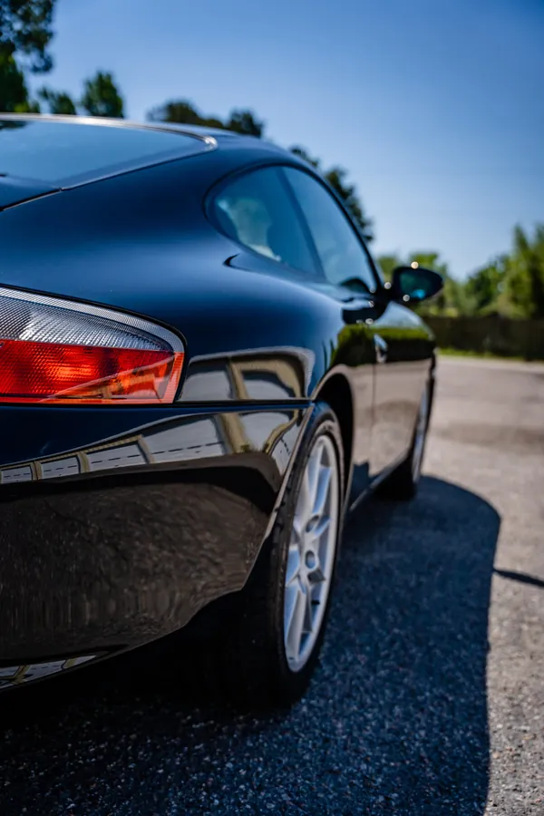 Black Porsche 911 (996) outdoors