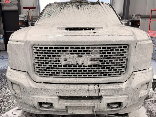 GMC Sierra HD front covered in foam